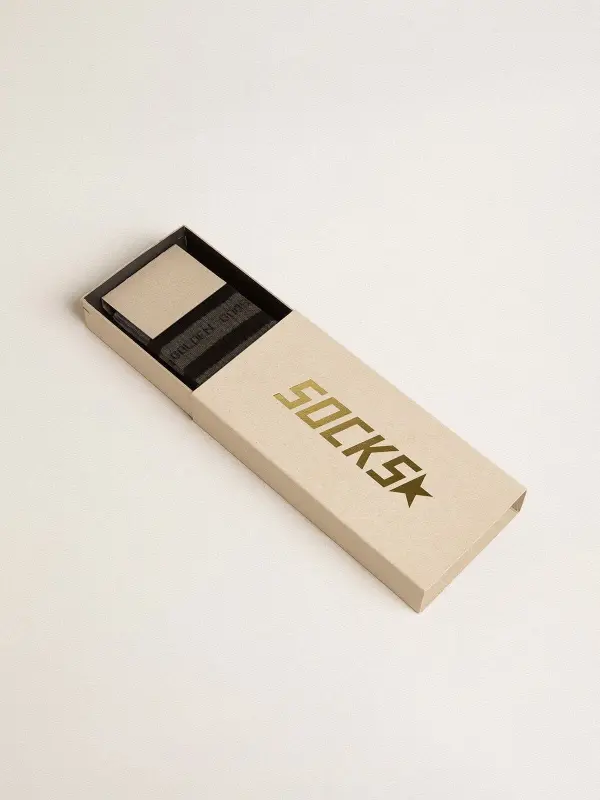 Grey socks with distressed details and black stripes online