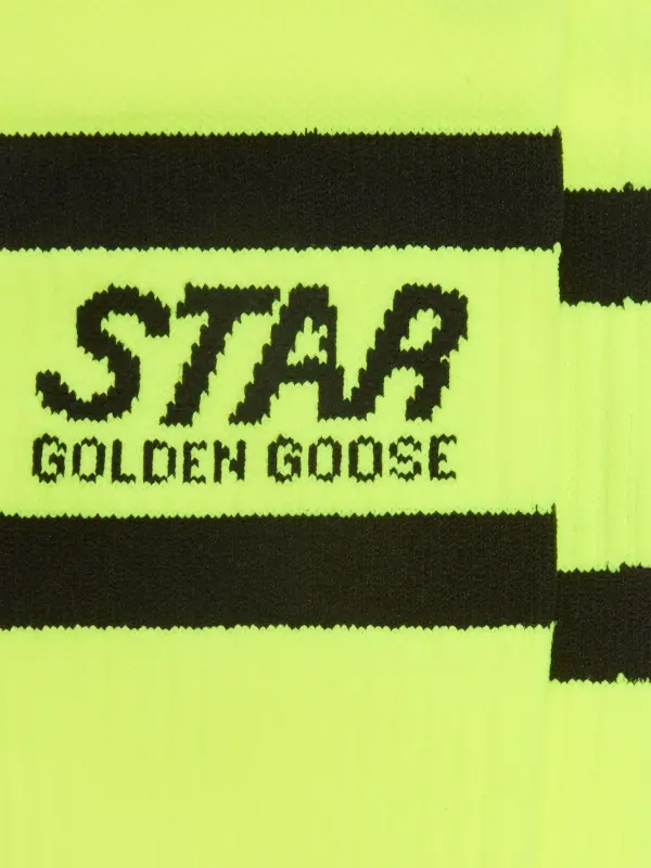 Neon yellow sports socks with black stripes online