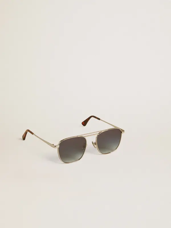 Aviator style sunglasses with silver frame and blue lenses online