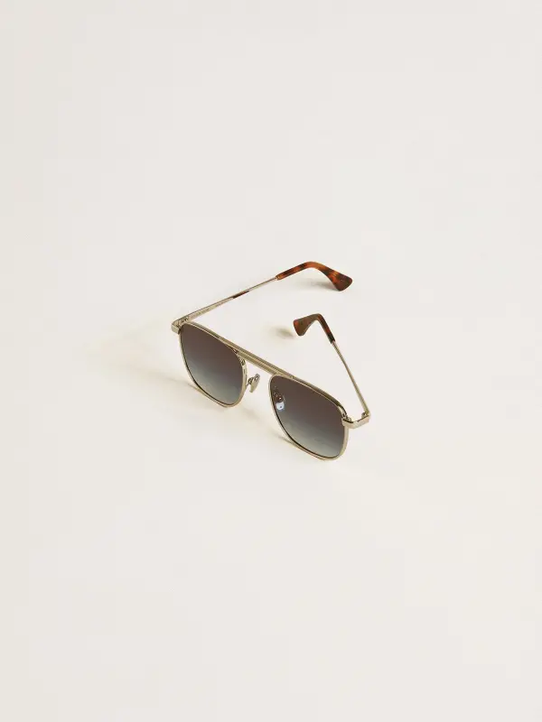 Aviator style sunglasses with silver frame and blue lenses online