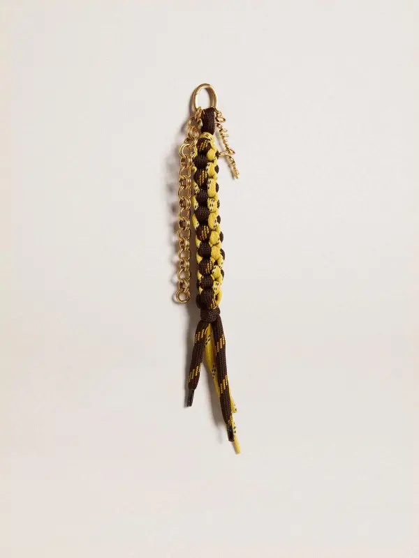 Charm with yellow and brown knotted hiking laces with chain online