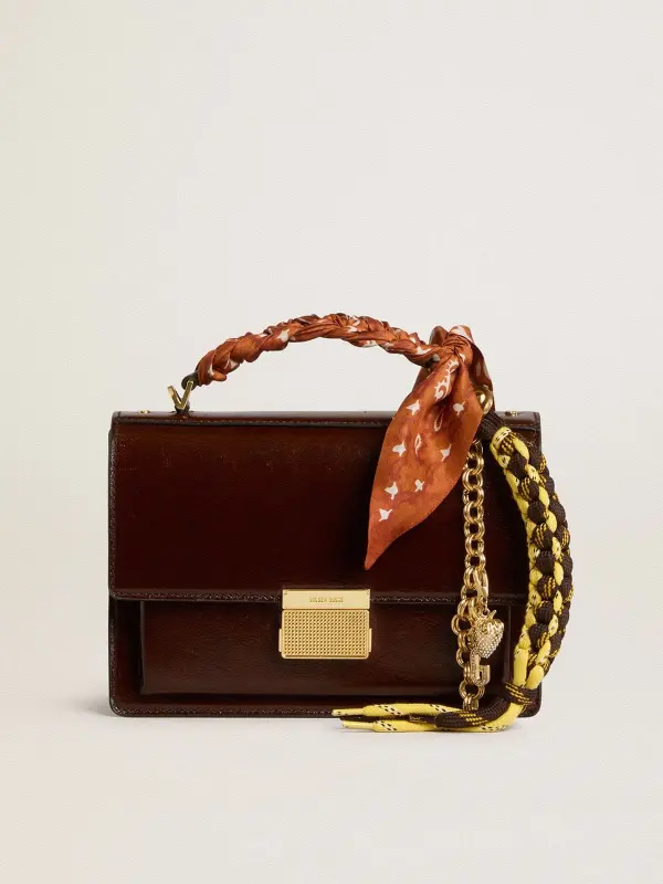 Charm with yellow and brown knotted hiking laces with chain online