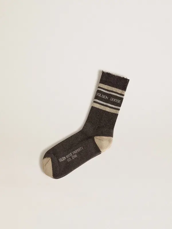 Dark grey socks with distressed details and cream and worn-white stripes online