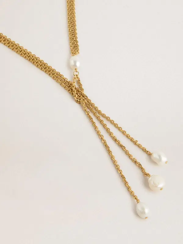 Necklace with antique gold-colored chains with pearls online
