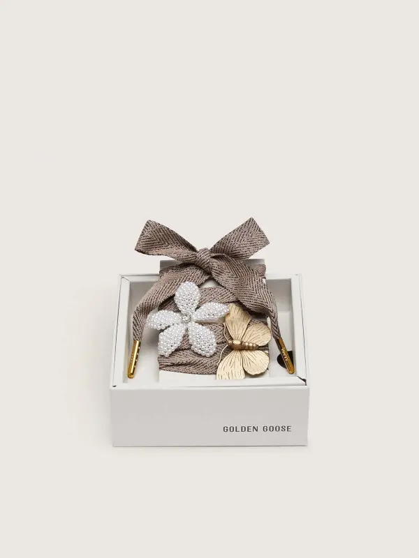 Skin "Sparkling" brown, black and silver herringbone laces with two appliqué charms online