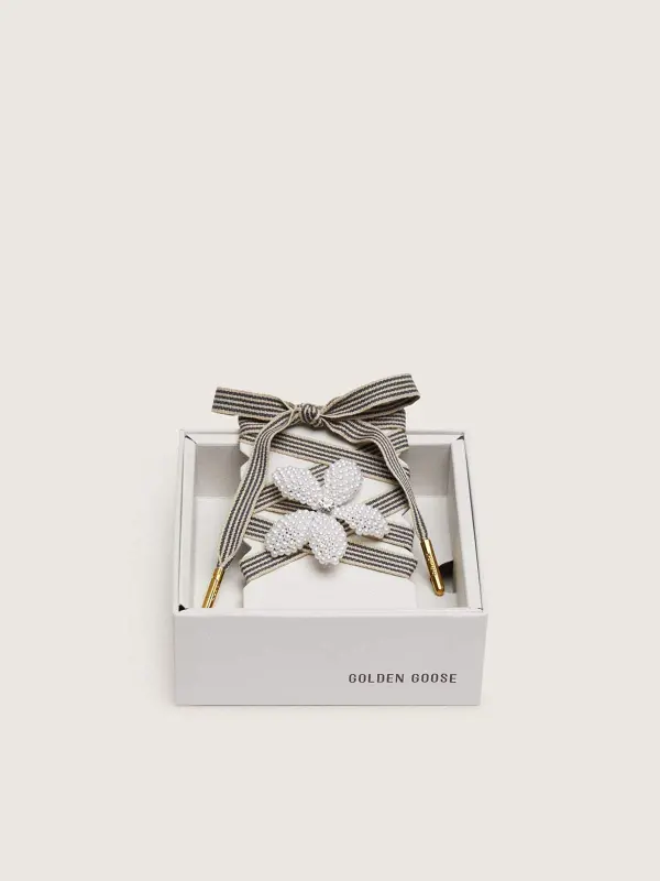 Skin "Vintage" black and beige striped laces with flower-shaped charm online