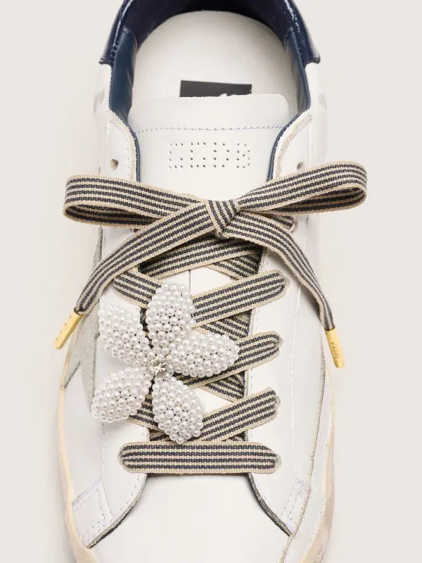 Skin "Vintage" black and beige striped laces with flower-shaped charm online