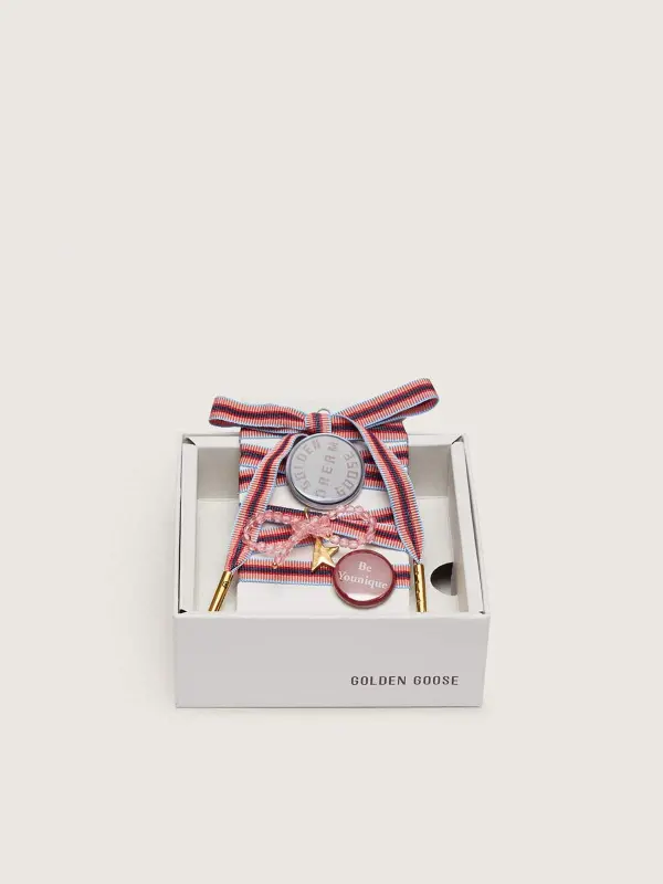Skins "Playful" colored striped laces with charm and pins online