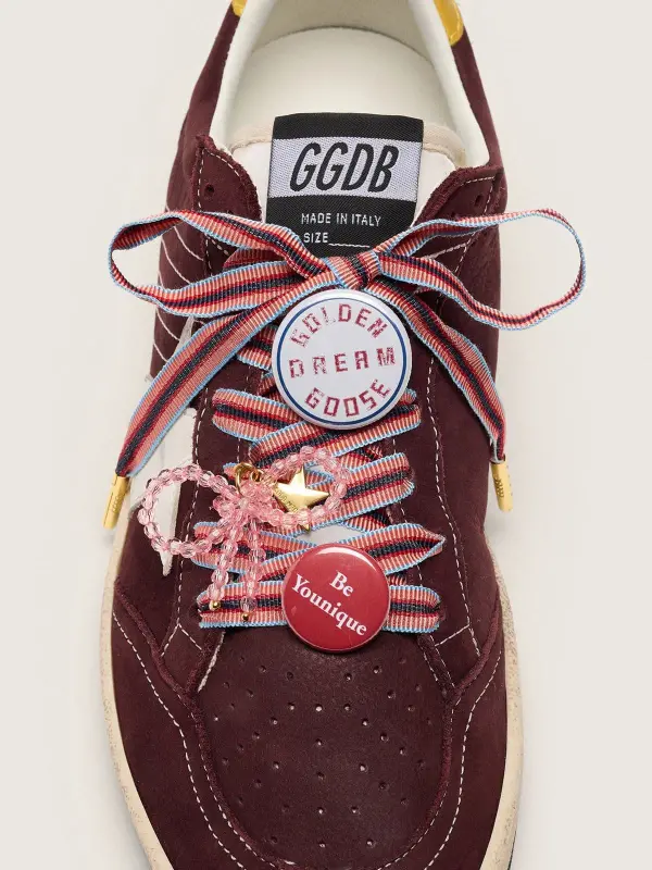 Skins "Playful" colored striped laces with charm and pins online
