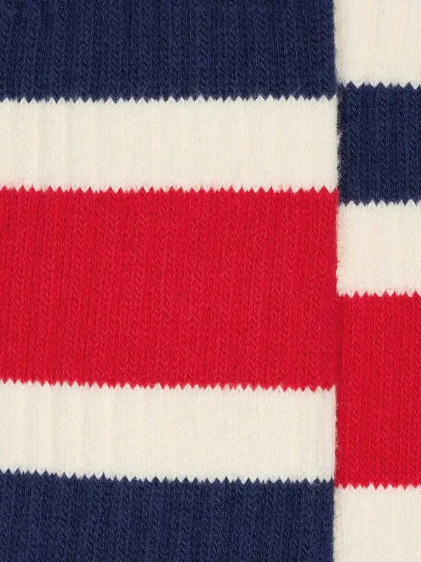 Worn-white socks with blue and red stripes online
