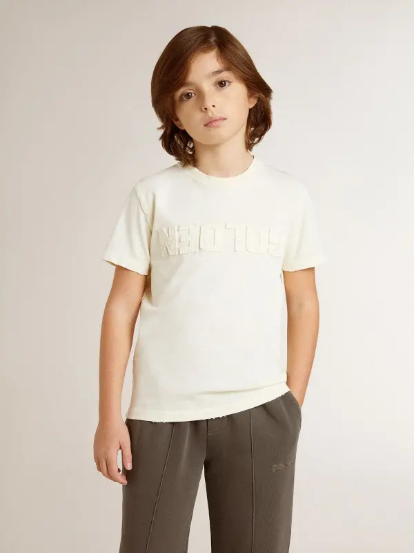Boy’s cream-colored T-shirt with raised logo online