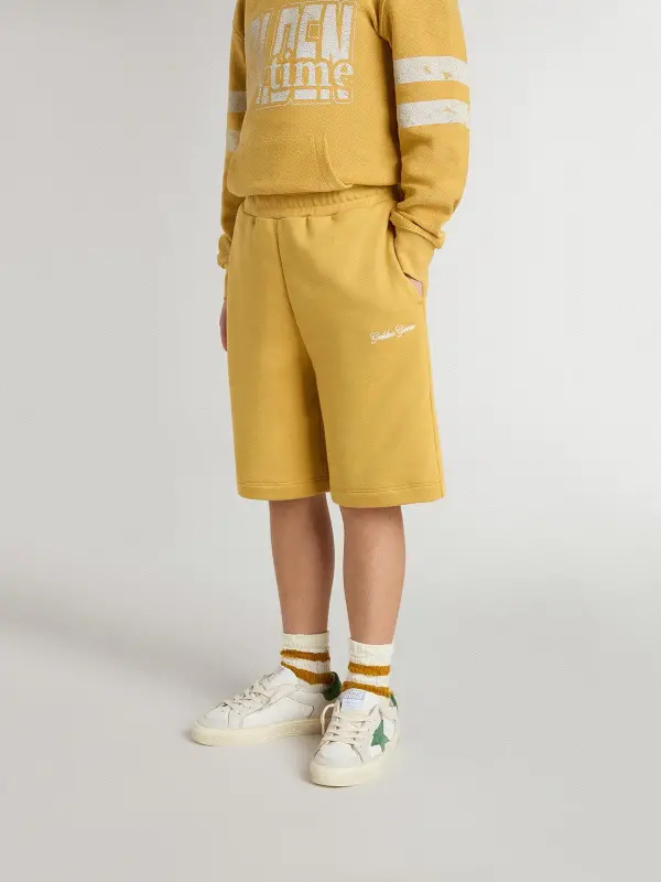 Kids jogging shorts in ochre yellow with embroidery online