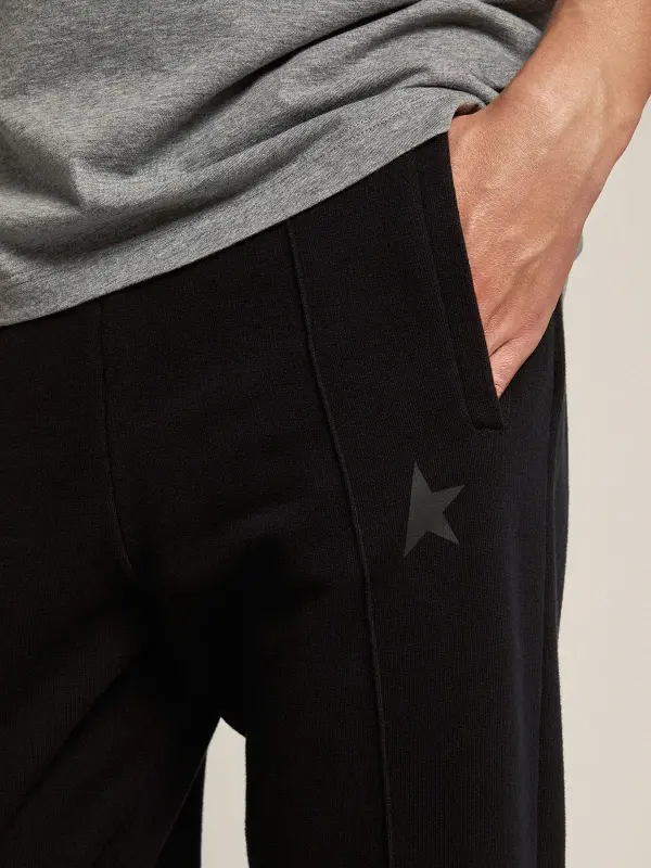 Men’s black joggers with star on the front online