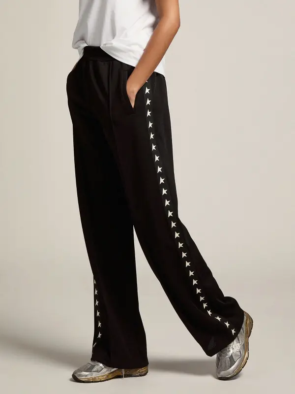 Women’s black joggers with white stars on the sides online