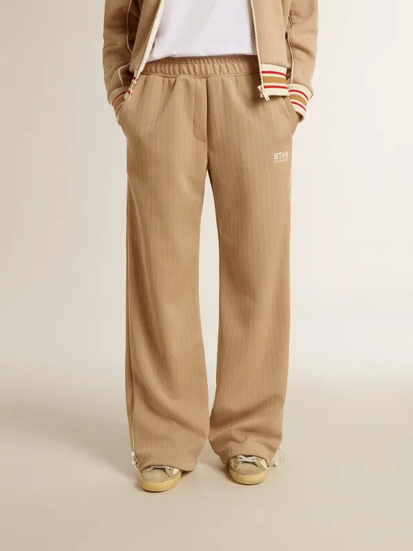 Women’s light beige joggers with white logo online