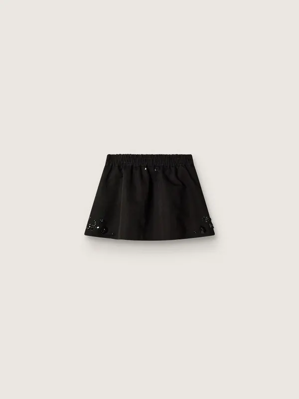 Women’s miniskirt in black cotton twill with floral sequin embroidery online