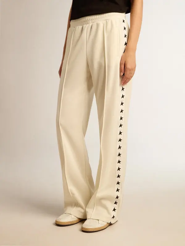 Women’s white joggers with stars on the sides online