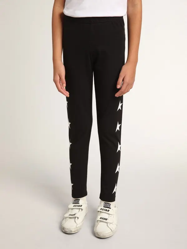 Girl’s black leggings with white stars on the sides online