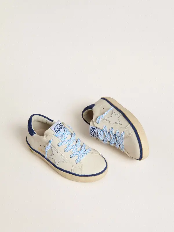 Young Super-Star in white leather with blue suede heel tab online