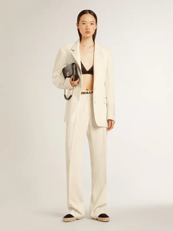 Women’s loose pants in worn-white tailored fabric online